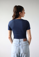 Organic cotton navy blue short sleeve t-shirt on model, back