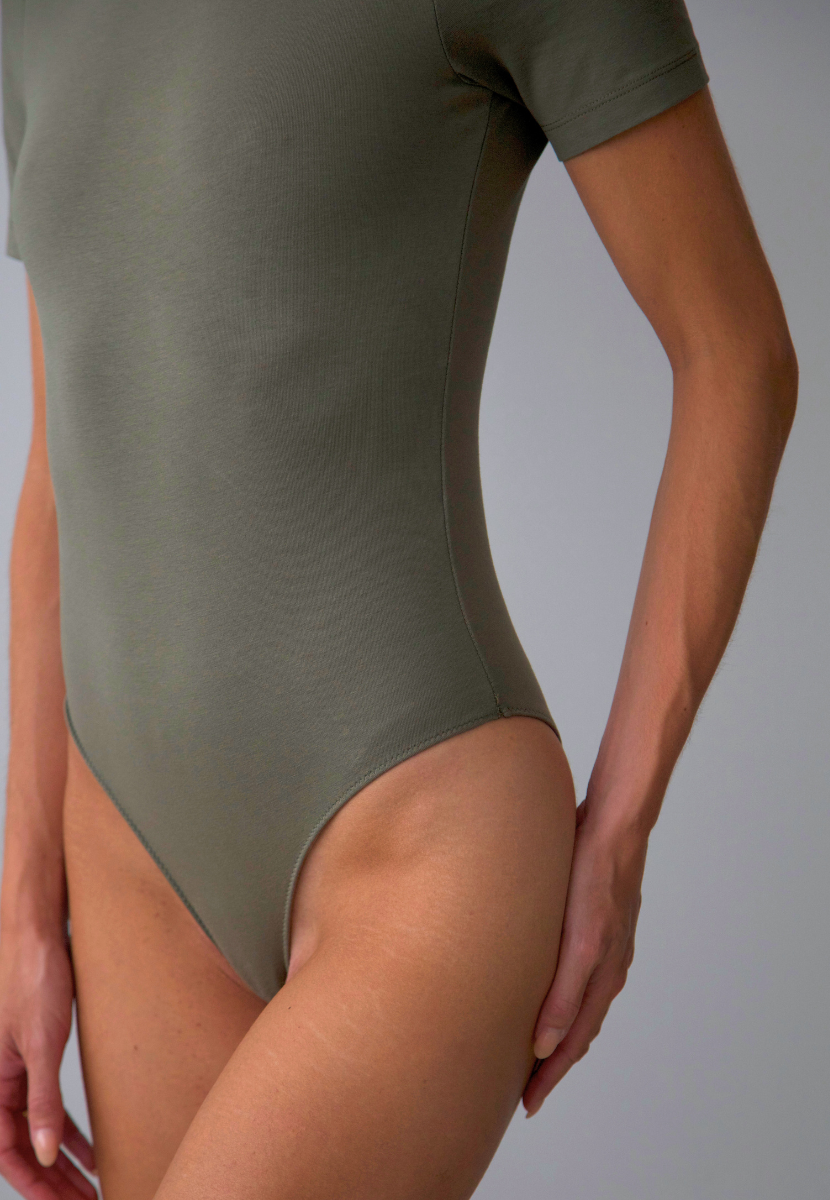 organic cotton crew neck bodysuit, burnt olive, brief close up 