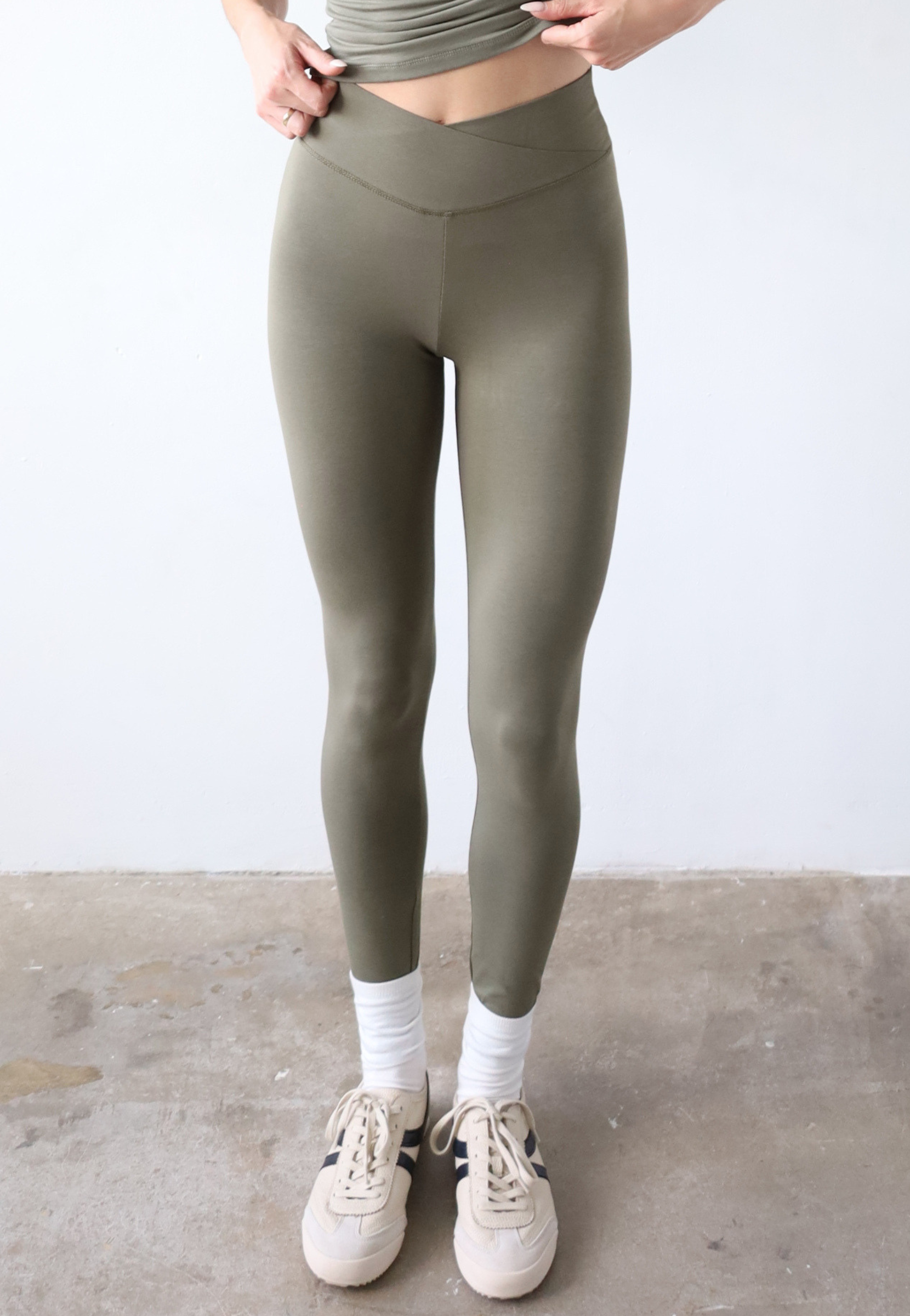Organic cotton wrap waist leggings, olive green, front