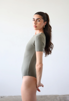 Organic cotton short sleeve crew neck bodysuit, olive green, side