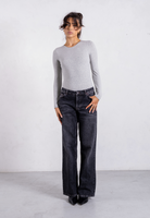 styled image of grey organic cotton crew neck long sleeve bodysuit