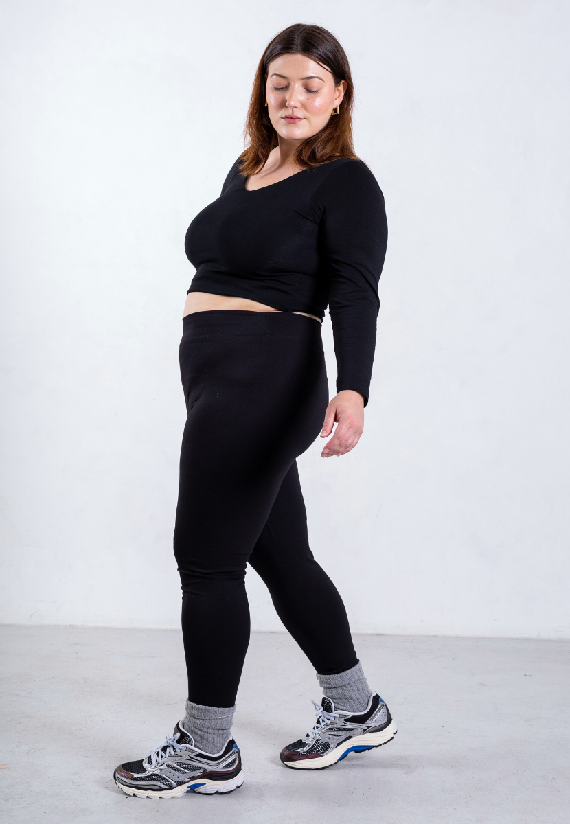 side of black organic cotton leggings