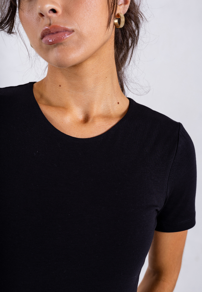 close up of black organic cotton short sleeve bodysuit