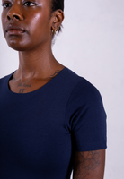 close up of organic cotton crew neck navy short sleeve bodysuit