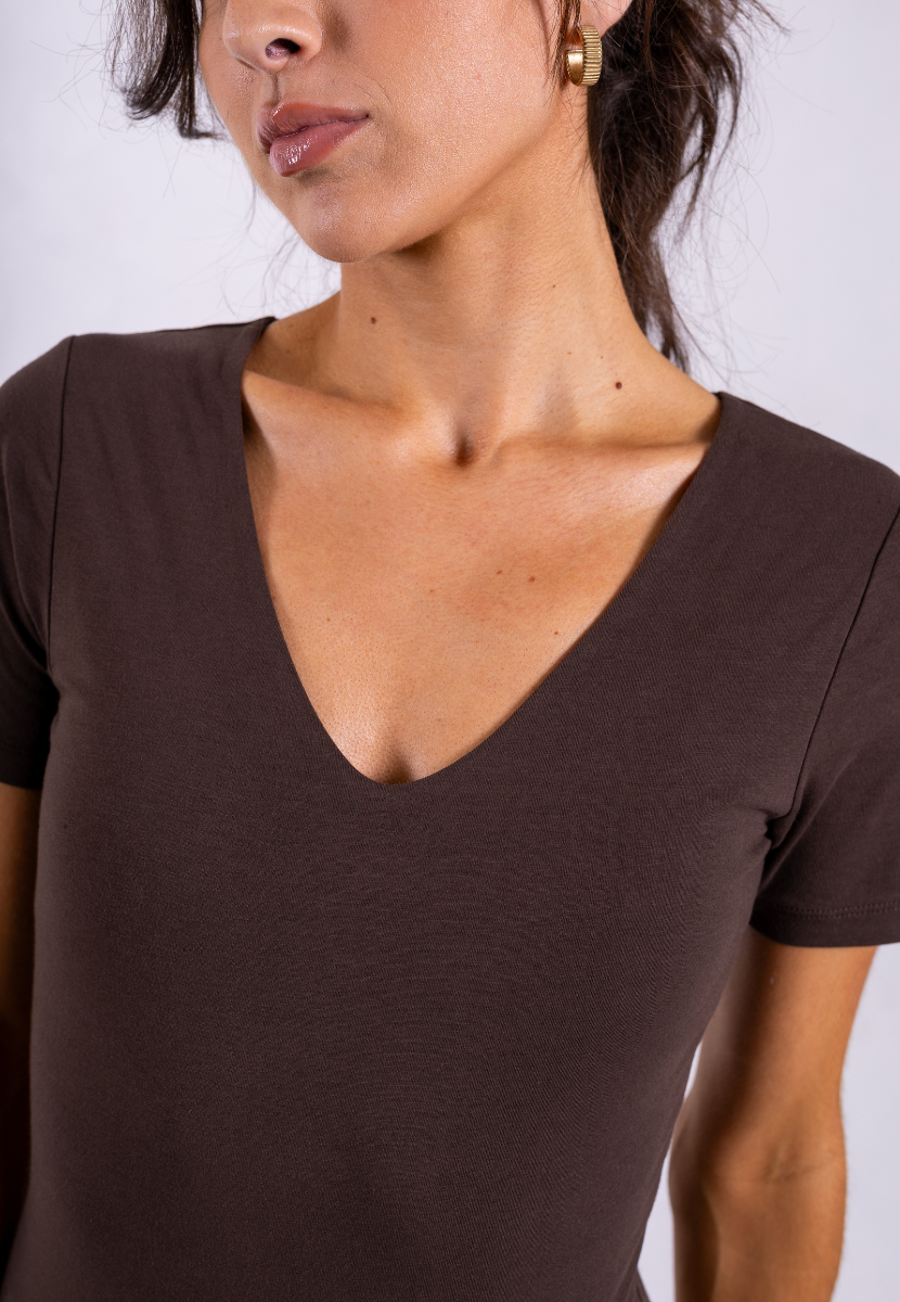 close up of brown organic cotton short sleeve v-neck bodysuit