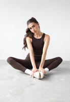 organic cotton dark brown leggings on model, front